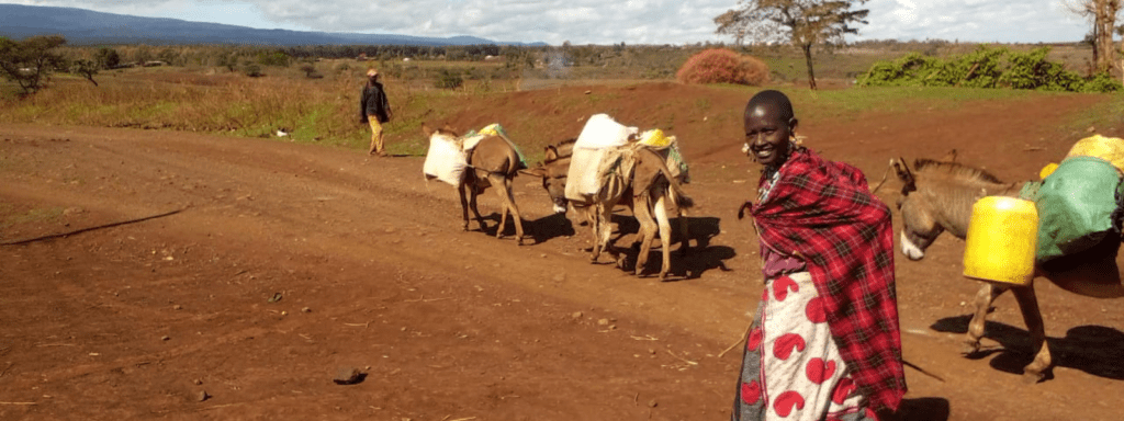 maasai woman carrying water